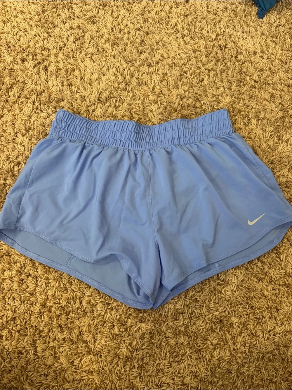 Nike Women's Sky Blue Running Shorts with Swoosh